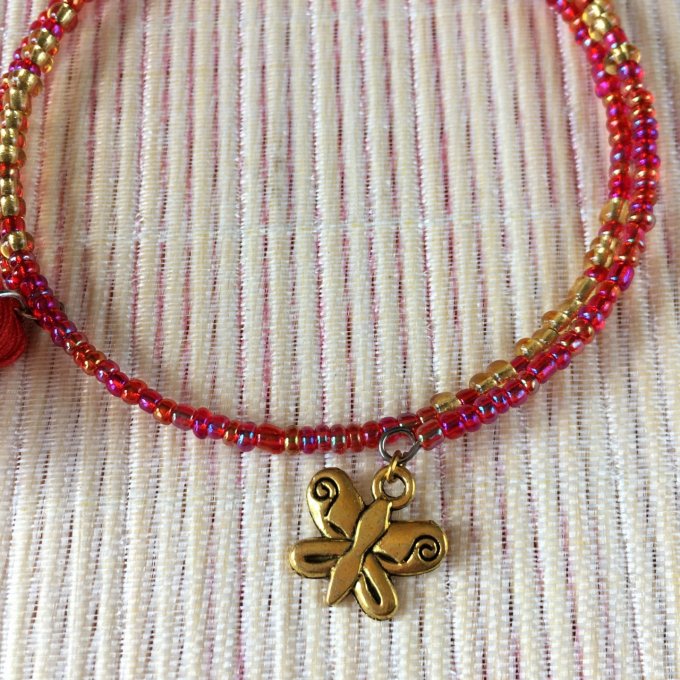 Bracelet circulaire en perles de rocailles rouge et doré, papillon