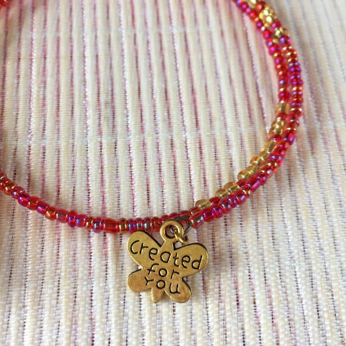 Bracelet circulaire en perles de rocailles rouge et doré, papillon