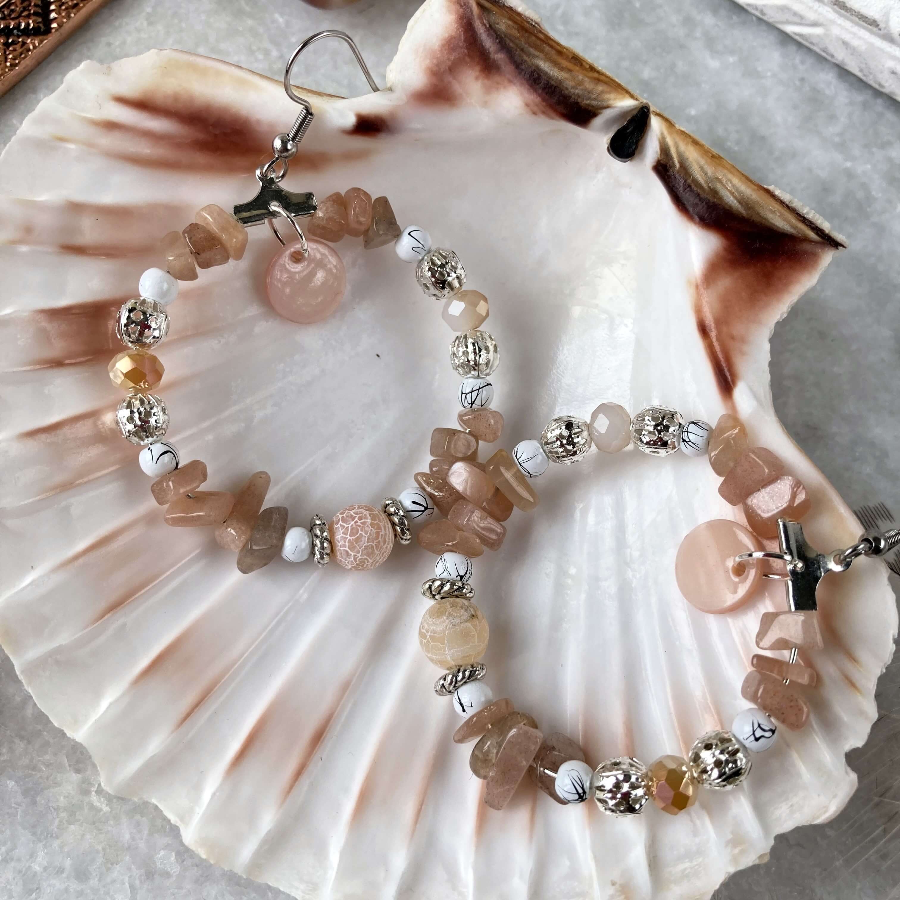 Boucles d'oreilles créoles en pierre de lune orangée